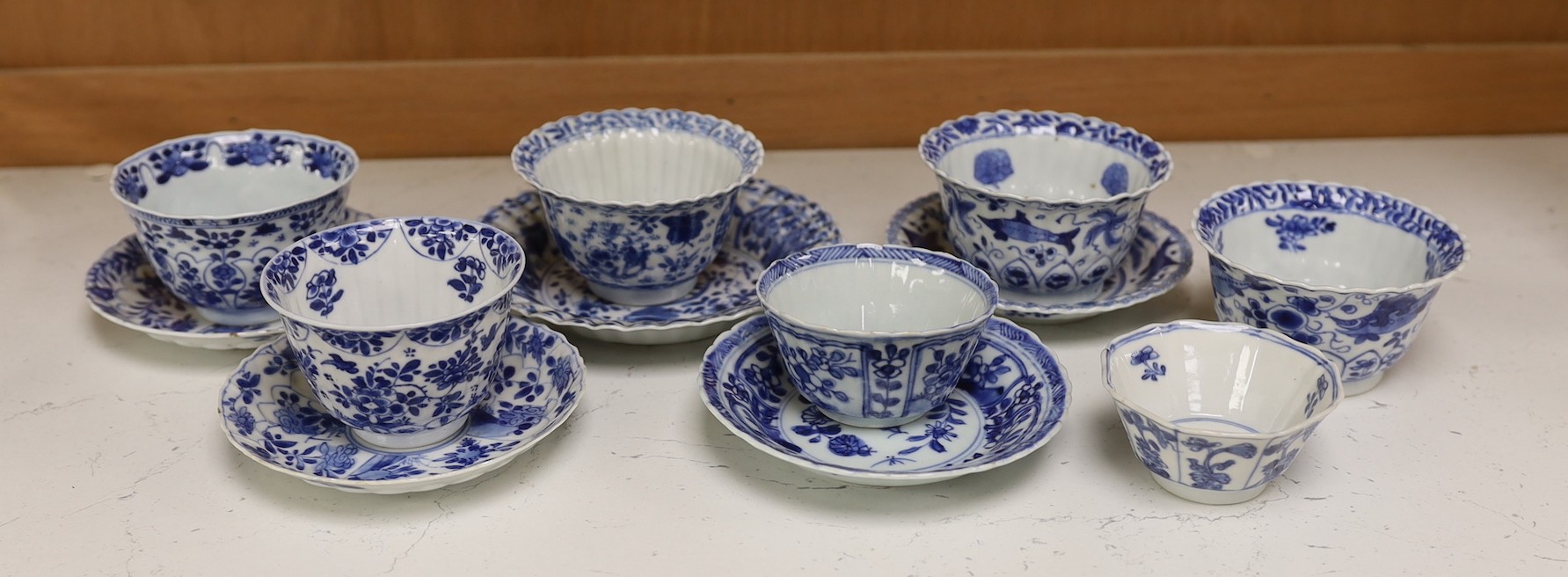 A group of seven Chinese blue and white tea bowls and five saucers, 18th-century